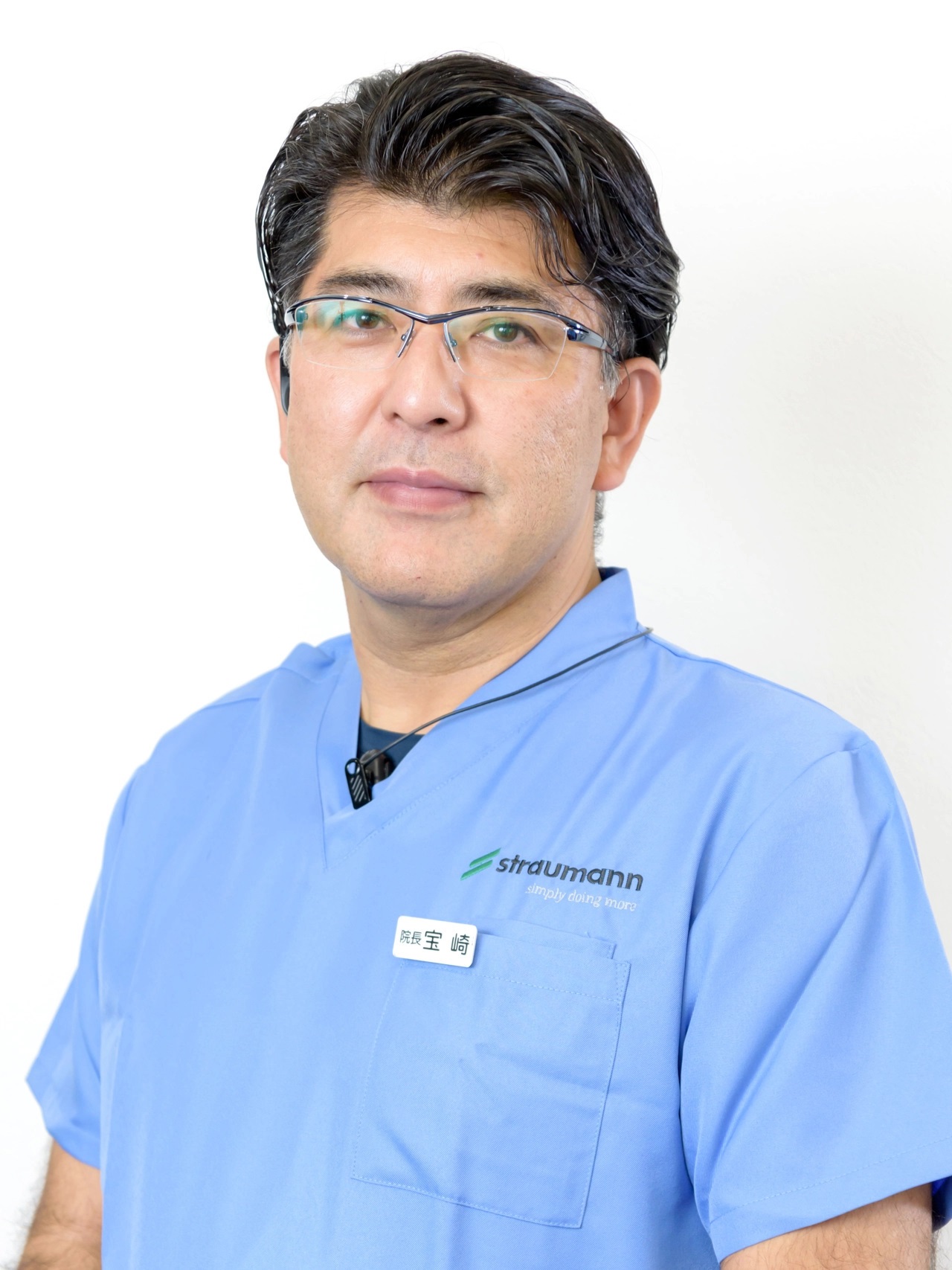 理事長　歯科医師 宝崎 岳彦